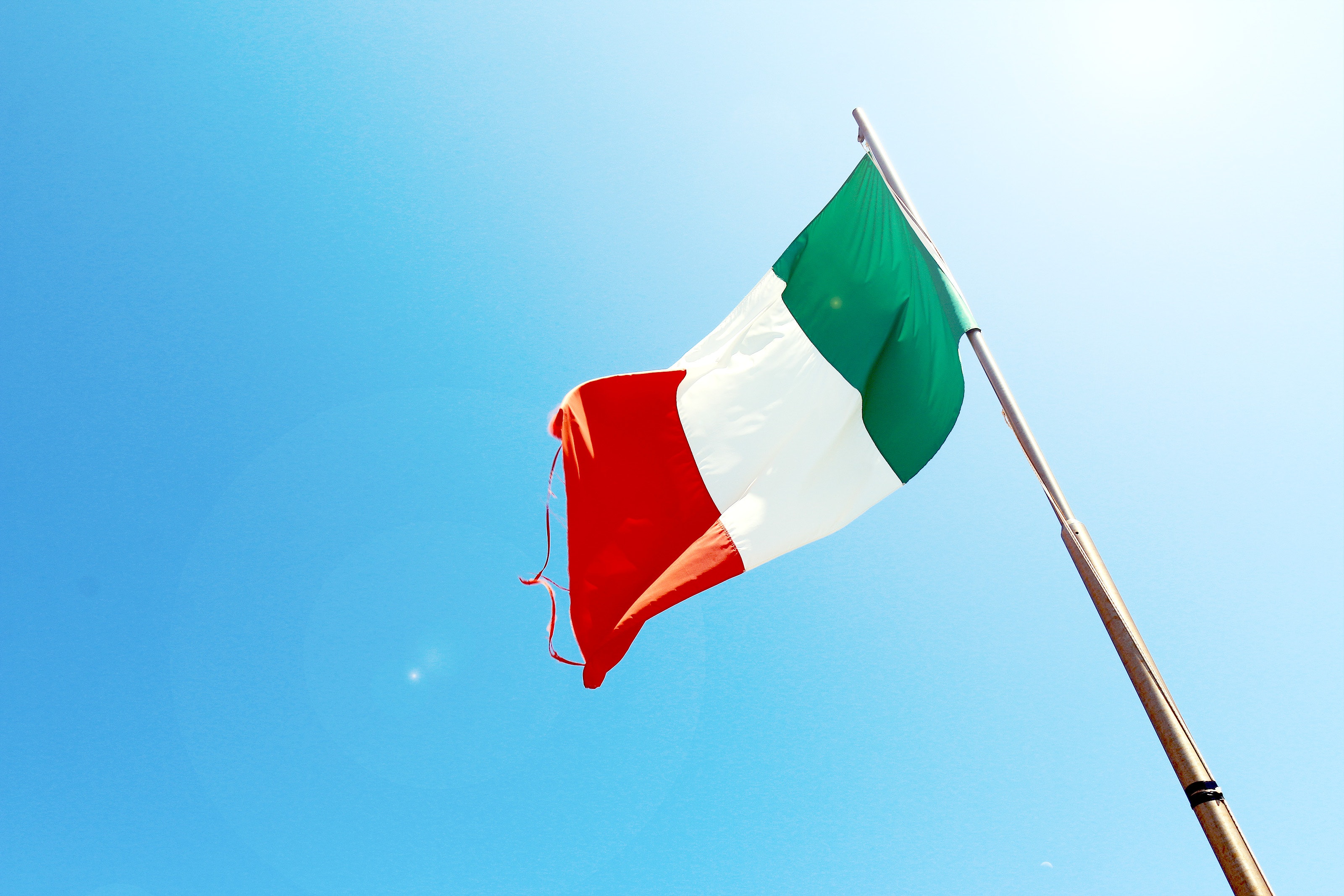 The Italian flag flying in the wind