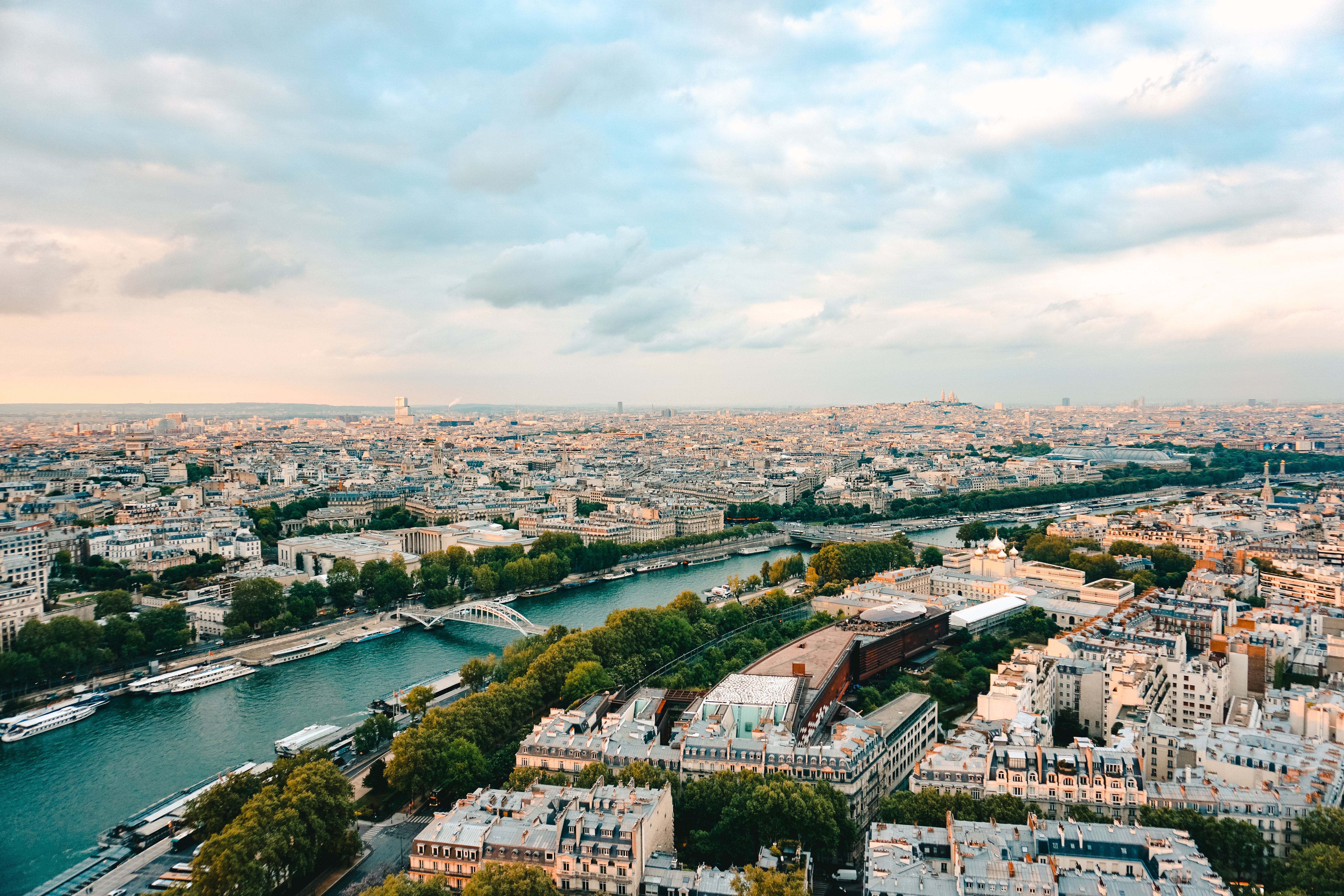 A view of the river Seine in the foreground and the Paris skyline in the background